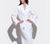 Woman modeling the Essential White Classic Bathrobe with white background.