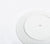 Backside of white porcelain Dinner Plate showing Snowe logo.