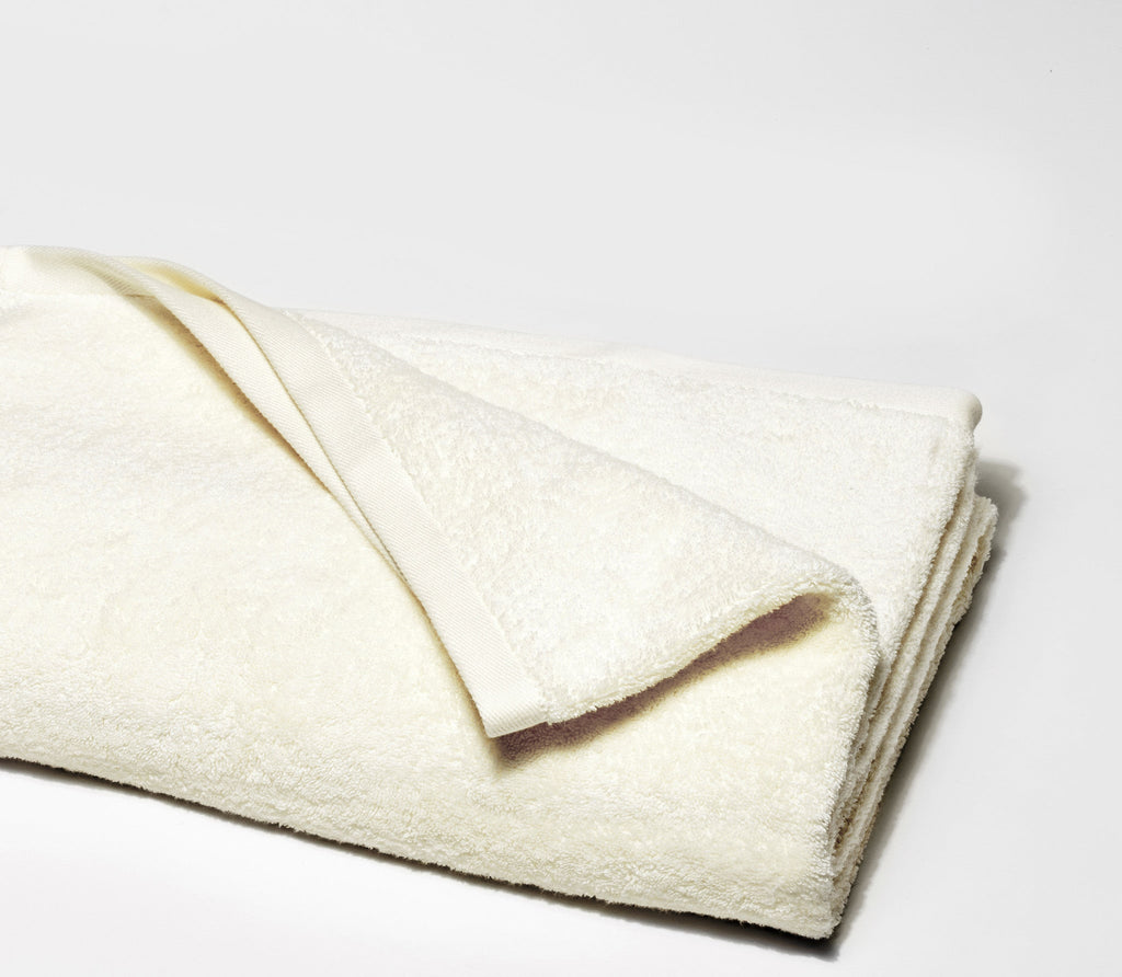 ivory-colored bath sheet.
