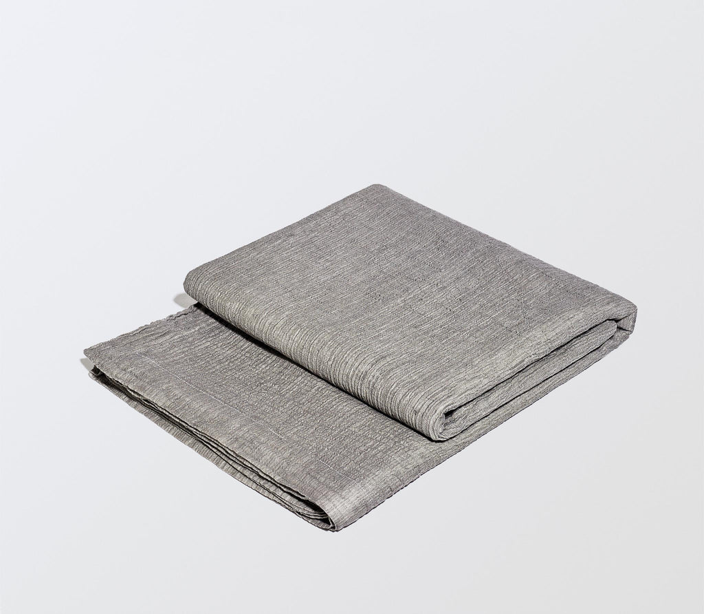 one neatly folded grey sheet