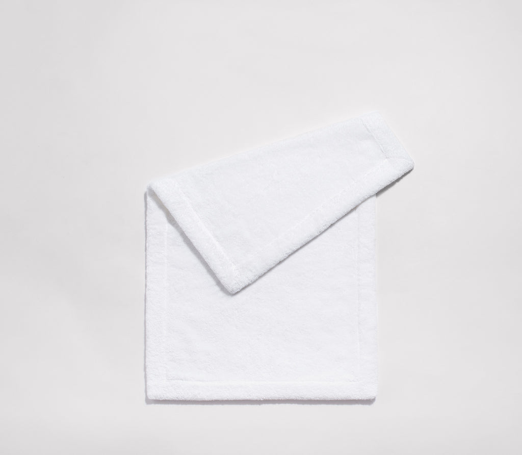 Essential white cotton bath mat