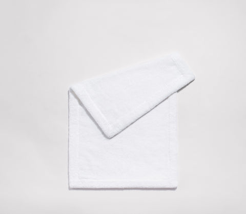 https://snowehome.com/cdn/shop/products/Cotton-Bath-Tub-Mat-Essential-White-Main_large.jpg?v=1542645231