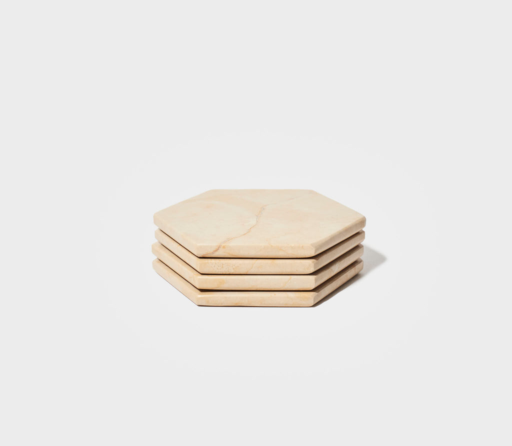 bundle collection of a sand colored marble coasters