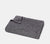 Folded Charcoal Grey Honeycomb Bath Towel with white background.